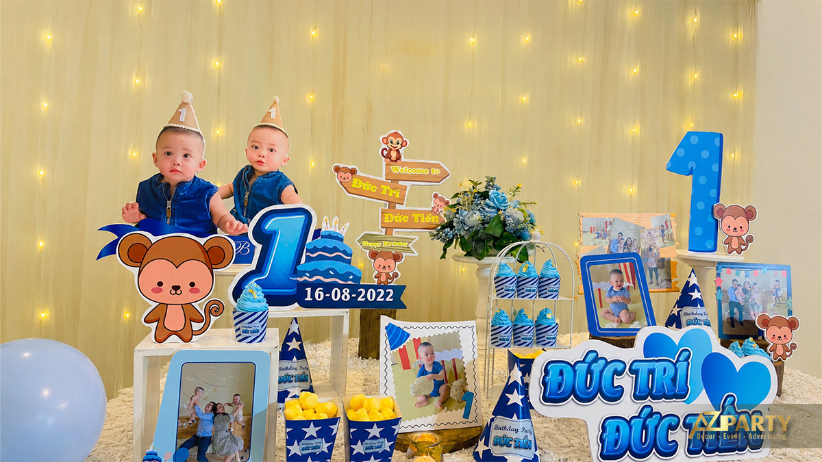 Backdrop trang trí thôi nôi rực rỡ và sinh động dành cho hai bé song sinh