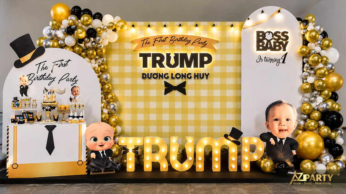 Khu vực sân khấu thôi nôi bé Trump chủ đề Boss Baby sang trọng với tông màu vàng đen