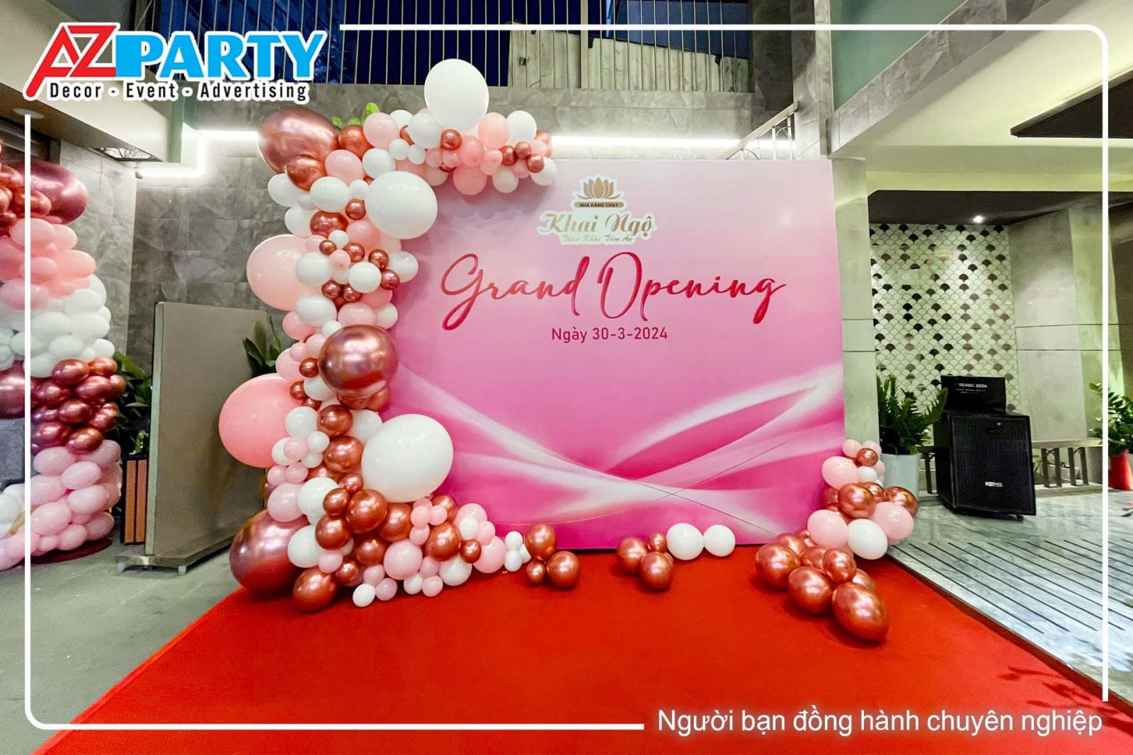 Backdrop khai trương tone hồng kèm viền bóng 