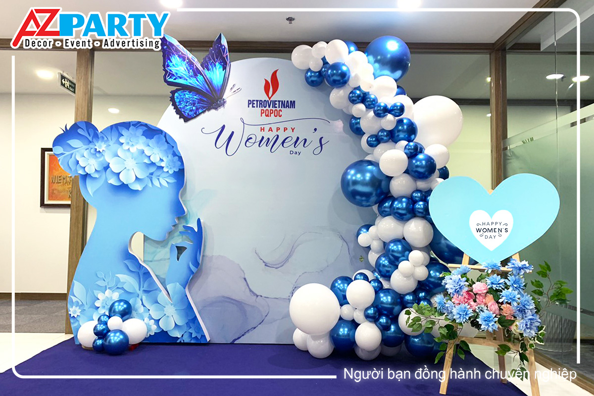 backdrop ngày 20 tháng 10 tone màu xanh dương, với hình ảnh phụ nữ bên trái làm điểm nhấn