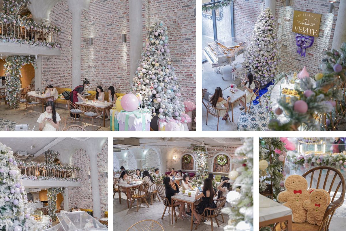 Không gian quán cà phê được trang trí Giáng sinh với tông màu pastel nhẹ nhàng, cây thông phủ tuyết và ánh sáng ấm áp. Khách ngồi trò chuyện trong khung cảnh lễ hội rực rỡ, tạo cảm giác ấm cúng và tinh tế.