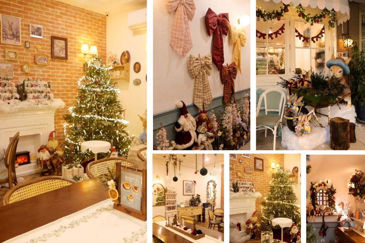 Quán cà phê nhỏ được trang trí theo phong cách ấm cúng với cây thông Noel, lò sưởi giả và nhiều chi tiết vintage như nơ vải, gấu bông và khung tranh cổ điển. Không gian mang ánh sáng vàng dịu, tạo cảm giác thân thuộc và lãng mạn trong mùa Giáng sinh.
