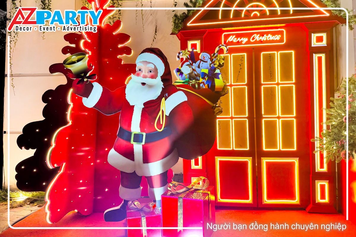 ông già noel cầm chiếc chuông vàng, vác theo bao quà tặng