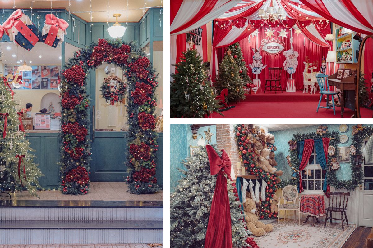 Không gian trang trí Giáng sinh nổi bật với tông đỏ – xanh cổ điển, kết hợp cây thông, vòng nguyệt quế, gấu bông và sân khấu nhỏ phong cách rạp xiếc. Toàn bộ bối cảnh mang đến cảm giác ấm áp, rực rỡ và tràn đầy không khí lễ hội.