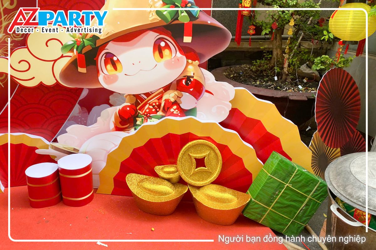 chú rắn linh vật tết Ất Tỵ và đồng tiền vàng